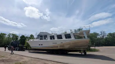 ‘Sometimes you just got to do the right thing.’ It took a team effort to remove abandoned boat from St. Croix River.