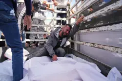 Israeli strikes kill at least 85 in Gaza as Israel allows more aid into Palestinian territory
